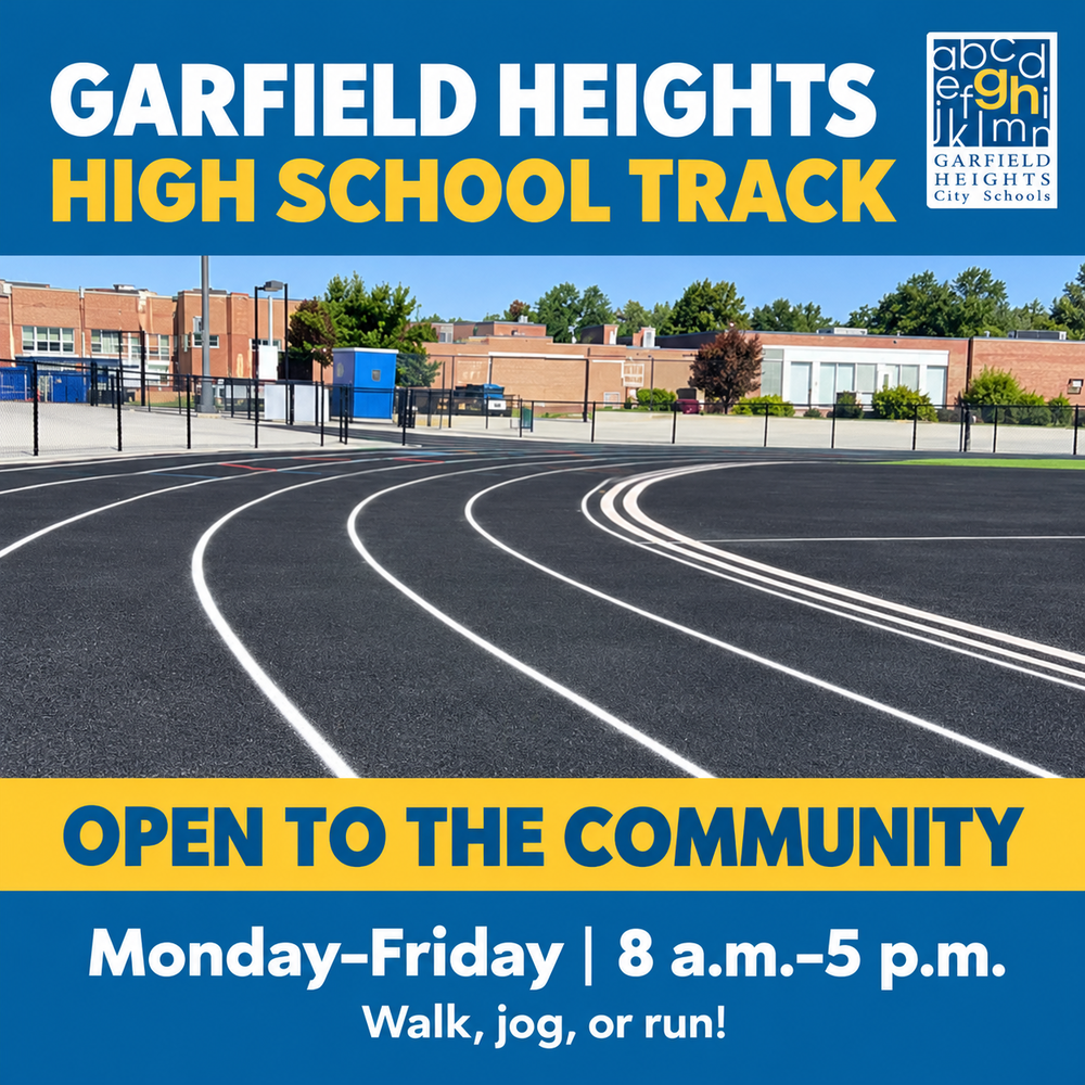 Garfield Heights High School track, pictured with curved running lanes, is open to the community Monday–Friday, 8 a.m.–5 p.m., for walking, jogging, or running.