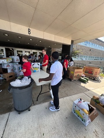 food bank distribution at GH middle school with student volunteers 