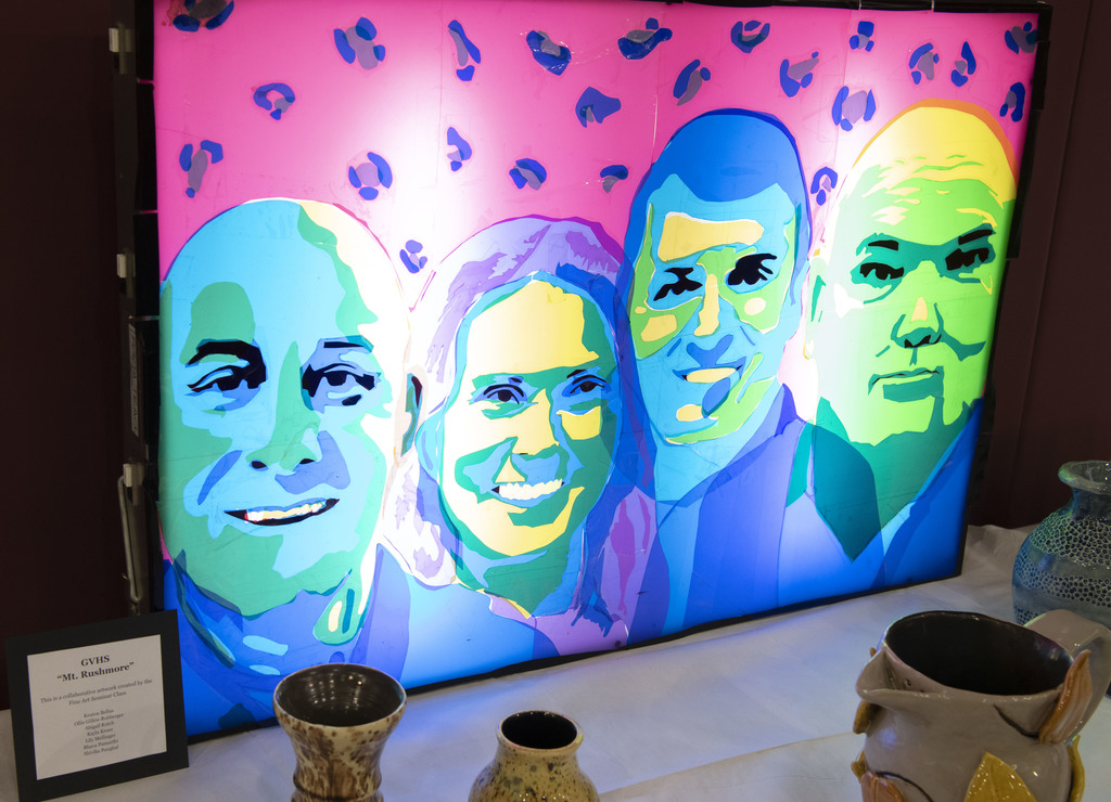 Brightly colored painting of the four GVHS administrators