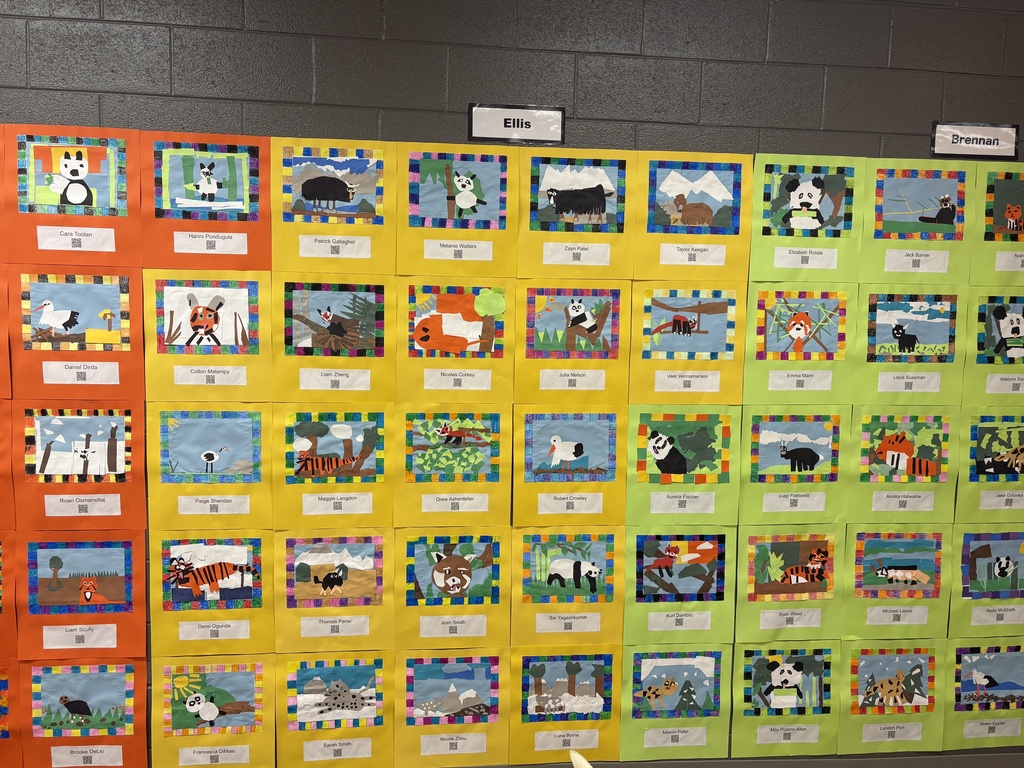 Artwork on the wall depicting different animals of China.
