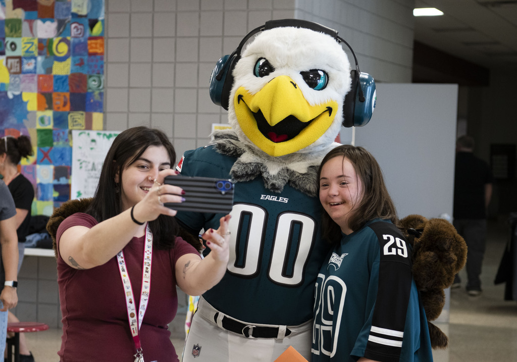 Teacher and student take a selfie with Swoop