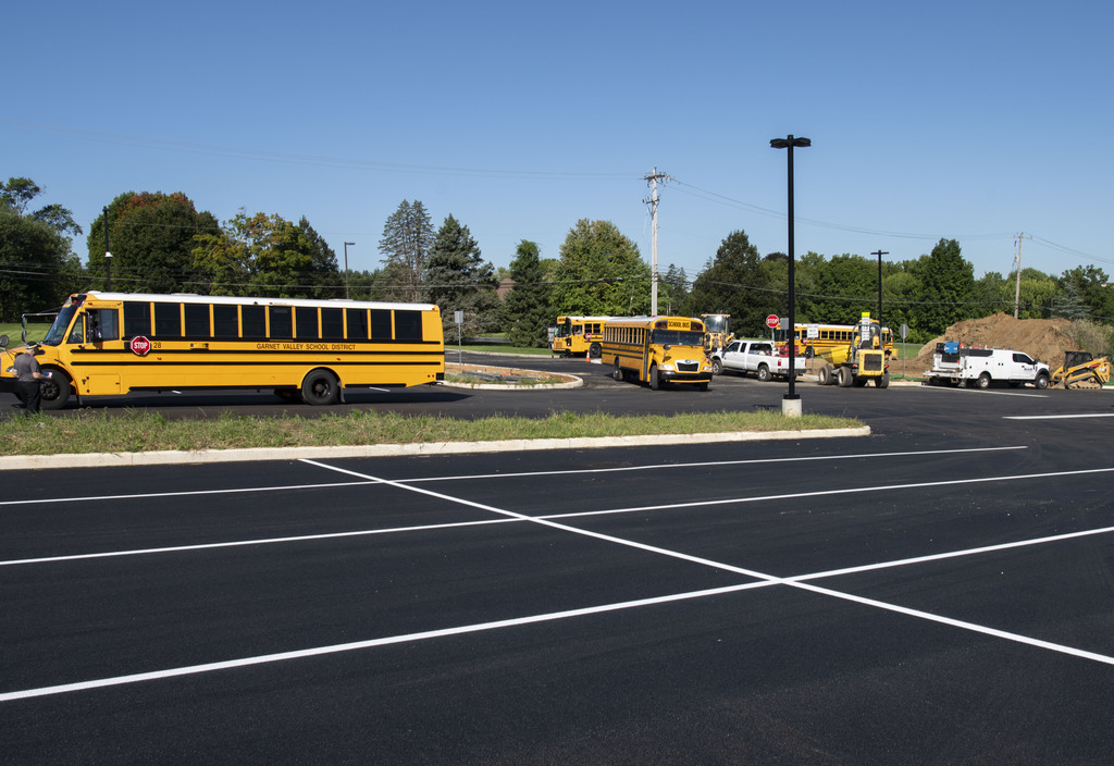 Buses moving into the Pennington parking lot