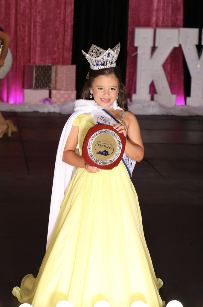 tudent Shoutout!!  Congratulations to first graders Lakelynn Gayhart for being crowned Little Miss Kentucky last weekend! Lakelynn completed amongst 48 other girls to win this title. WOW! We are proud of you!