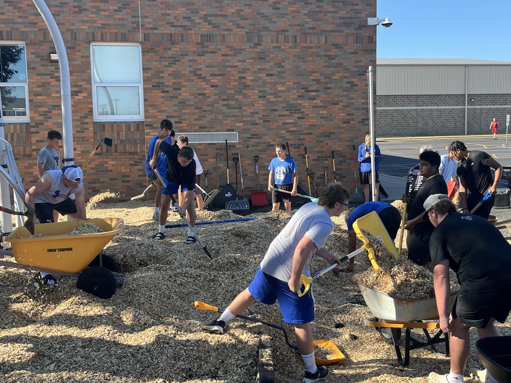 Blue Dragon Football Team Serving Their Community!