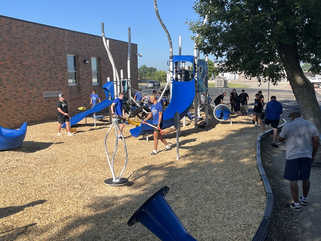 Blue Dragon Football Team Serving Their Community!