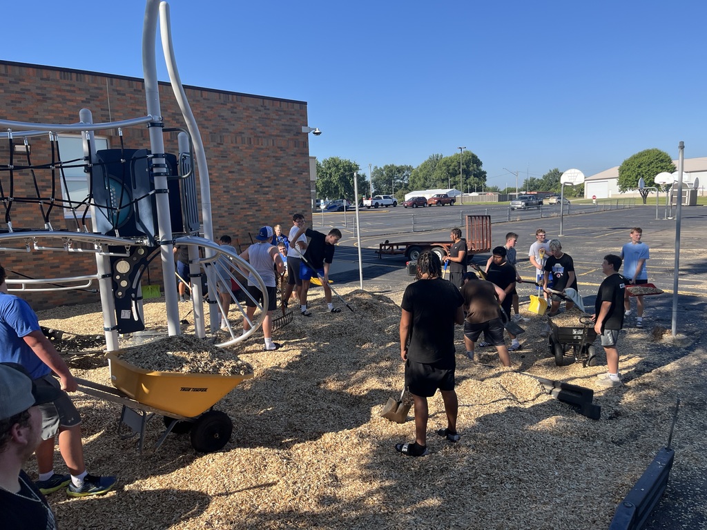 Blue Dragon Football Team Serving Their Community!