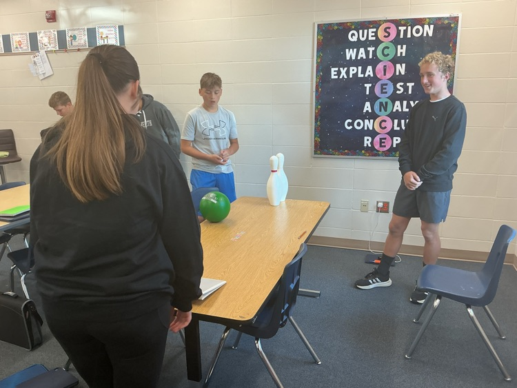 Nevi, Noah, and Lane learn about mass and how it affects kinetic energy