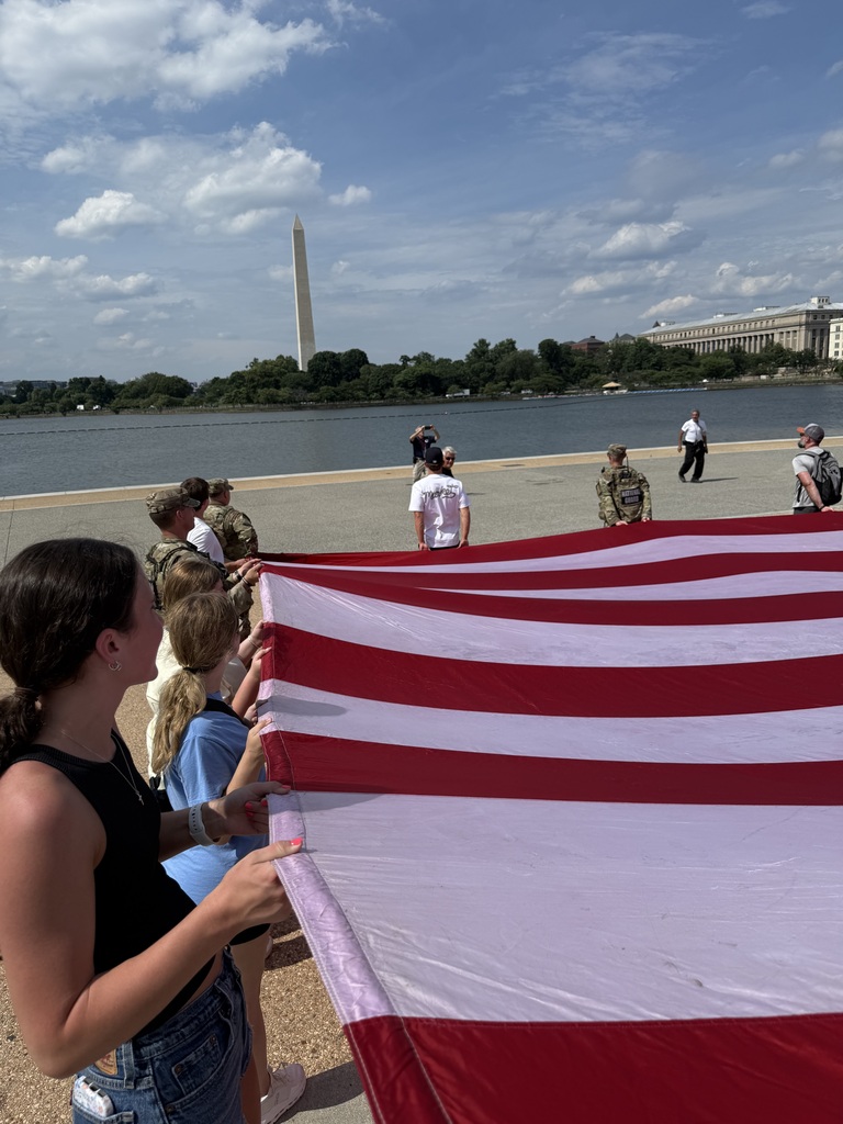 GHS Students helping retire a flag at the Jefferson Memorial with the National Guard