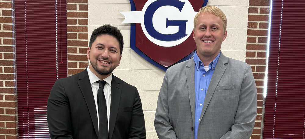 New J.E. Ober Elementary assistant principal Michael Reyes with Dan Durrwachter