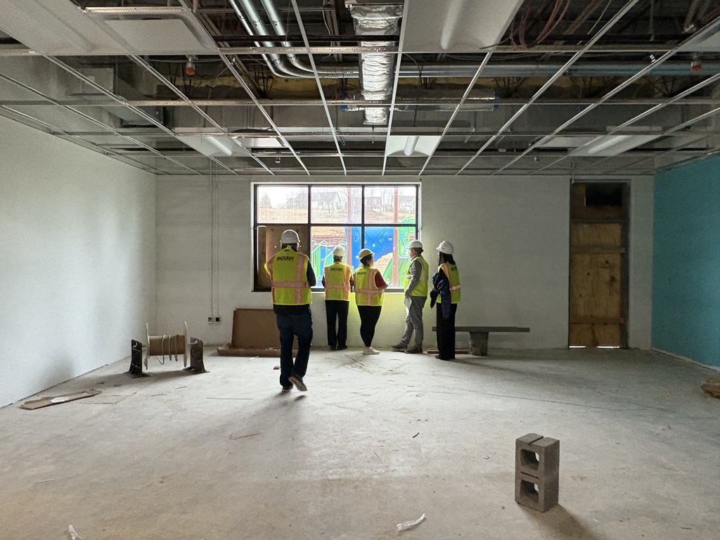 GCPS Administrators and Board Members review the progress of renovations to the future Broad Ford School.