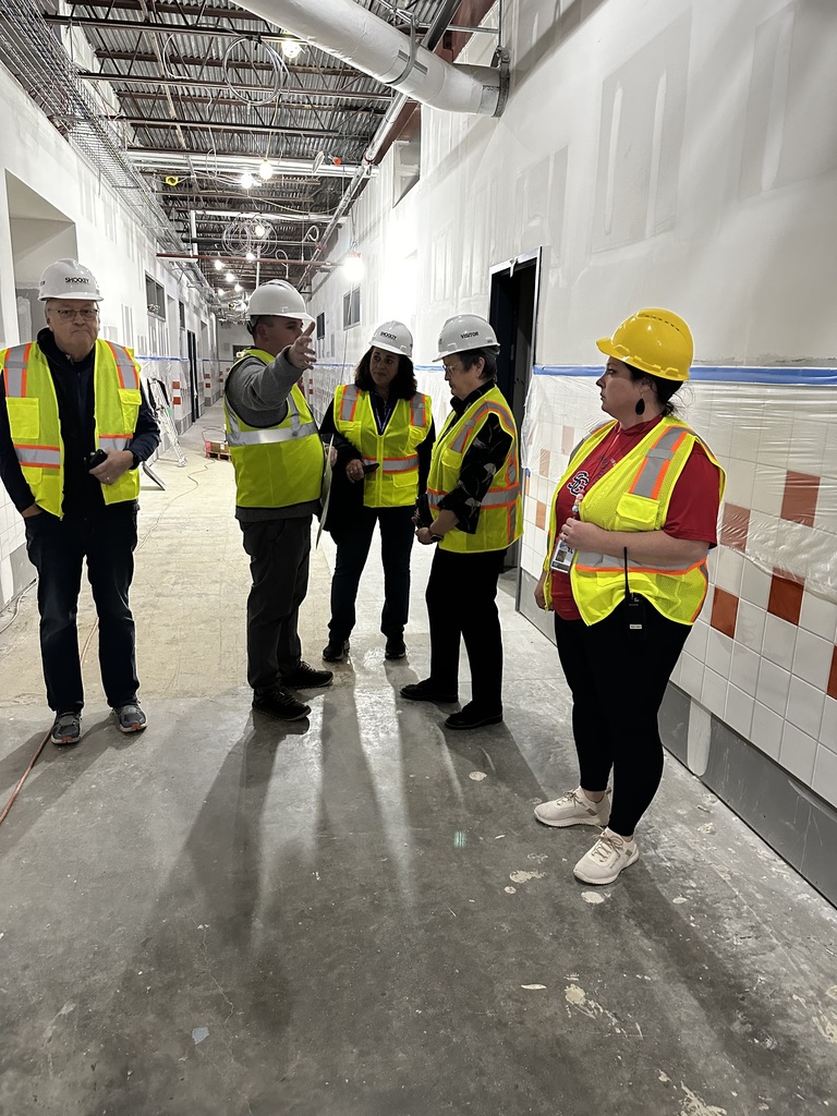 GCPS Administrators and Board Members review the progress of renovations to the future Broad Ford School.