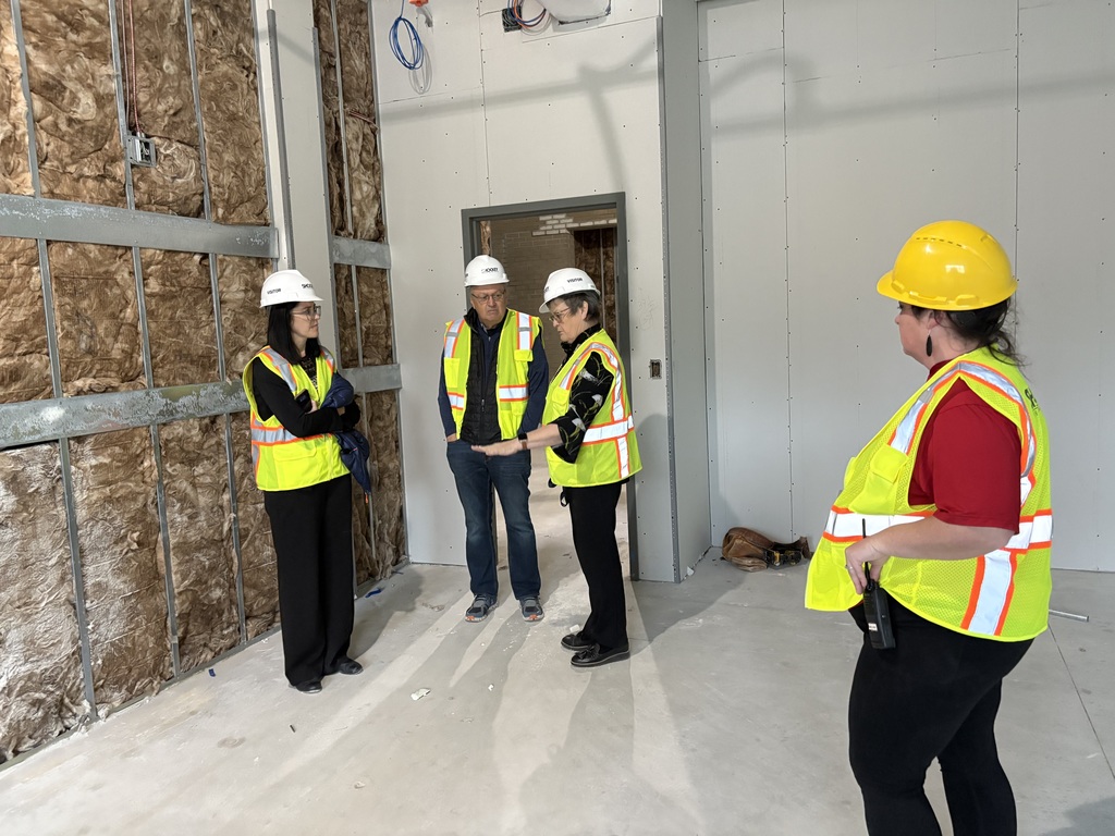 GCPS Administrators and Board Members review the progress of renovations to the future Broad Ford School.