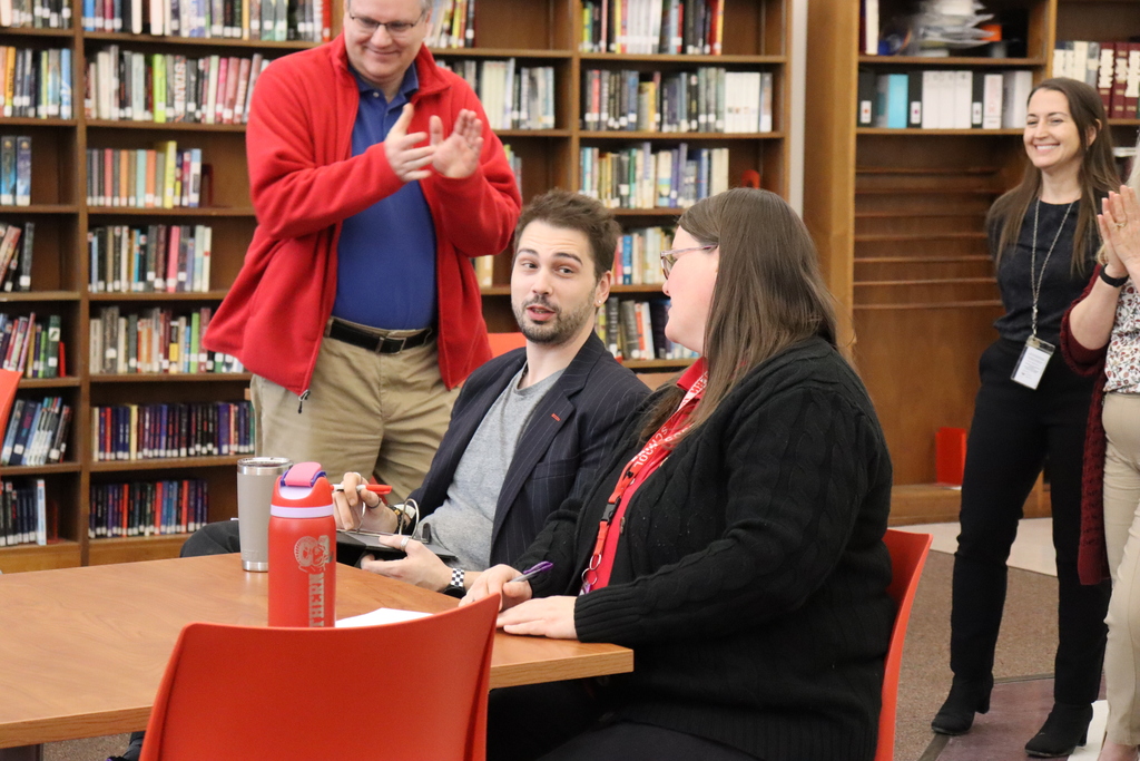 "Sharks" discuss a pitch amongst themselves.