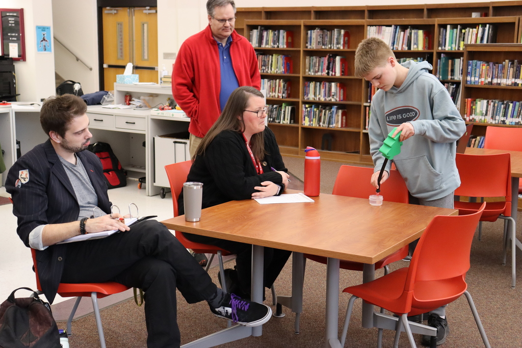 A student pitches his prototype to the "sharks."