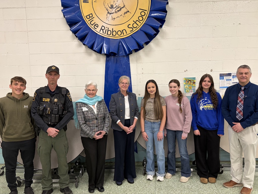 Group image with representatives from NHS, Let's Drive, and the Sheriff's Dept.