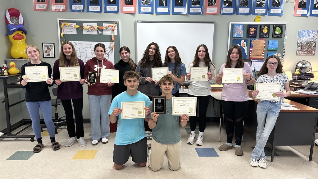 Students from Northern Middle pose with their MD History Day State Competition certificates and plaques.