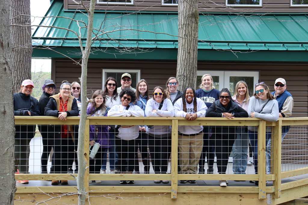 MD Teachers of the Year pose in front of the Tree Canopy Observation Area, part of the GCPS Hickory Environmental Education Center.