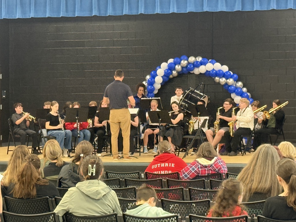 Students in the Broad Ford 6th Grade Band perform for the audience at the ribbon cutting ceremony.