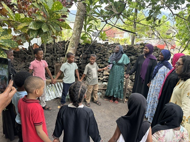 Students from Comoros stand in a circle as part of GaCo's STEM Waypoints, as detailed in the story.