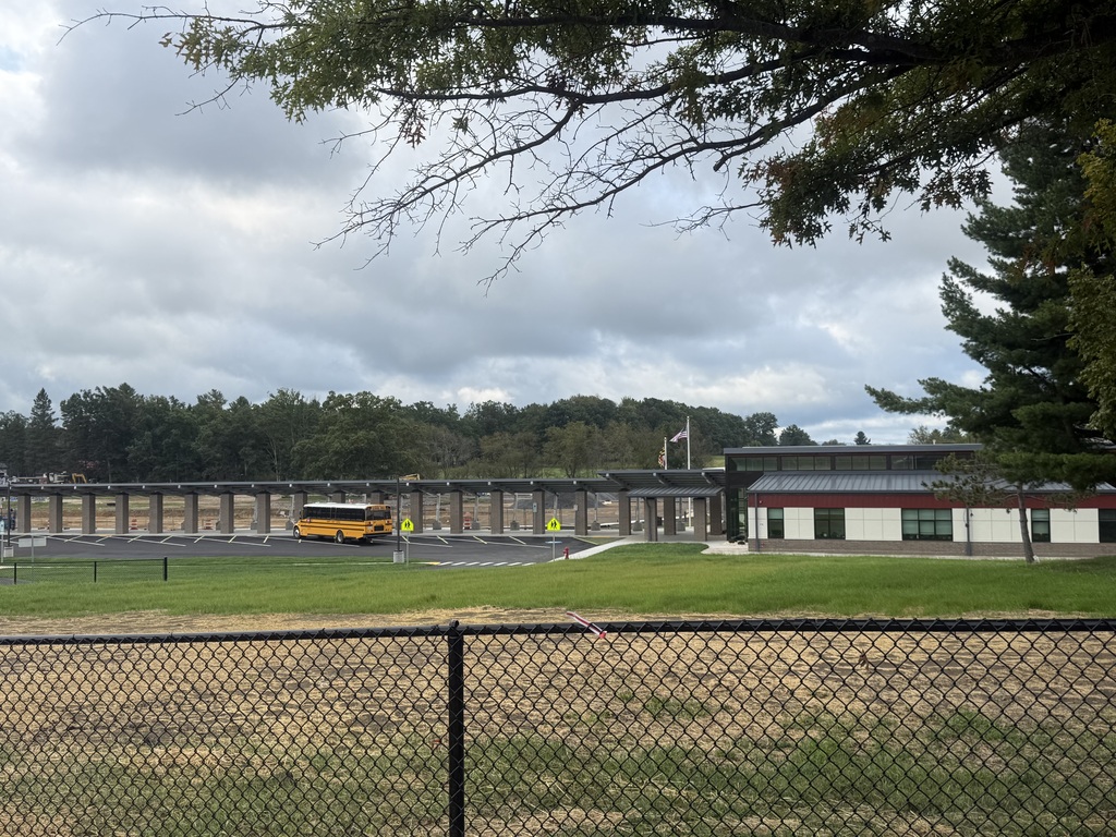 Image of Broad Ford School and the bus loop, with recently excavated land behind it.