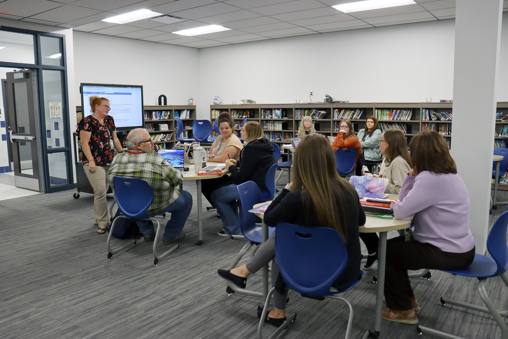 Image of Broad Ford staff participating in professional development in the school's media center.