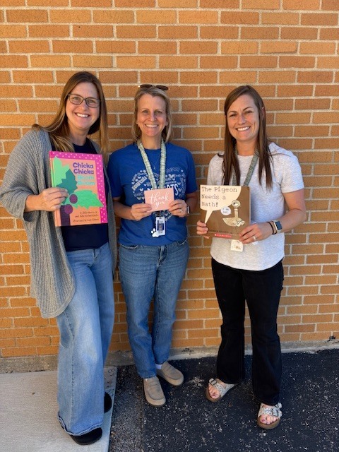 PAT and Pre-K teachers receiving book donation from our FCCLA students 