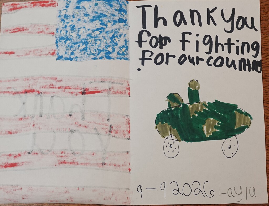 A child's drawing includes an American flag and a military vehicle. The text reads, "Thank You for Fighting for Our Country."