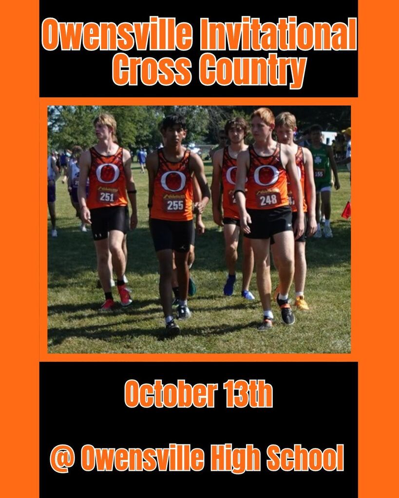 A group of runners wearing orange uniforms walks on a grassy field with trees in the background.
