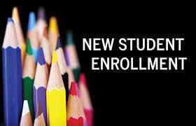 multiple colored pencils on a black background, reading new student enrollment