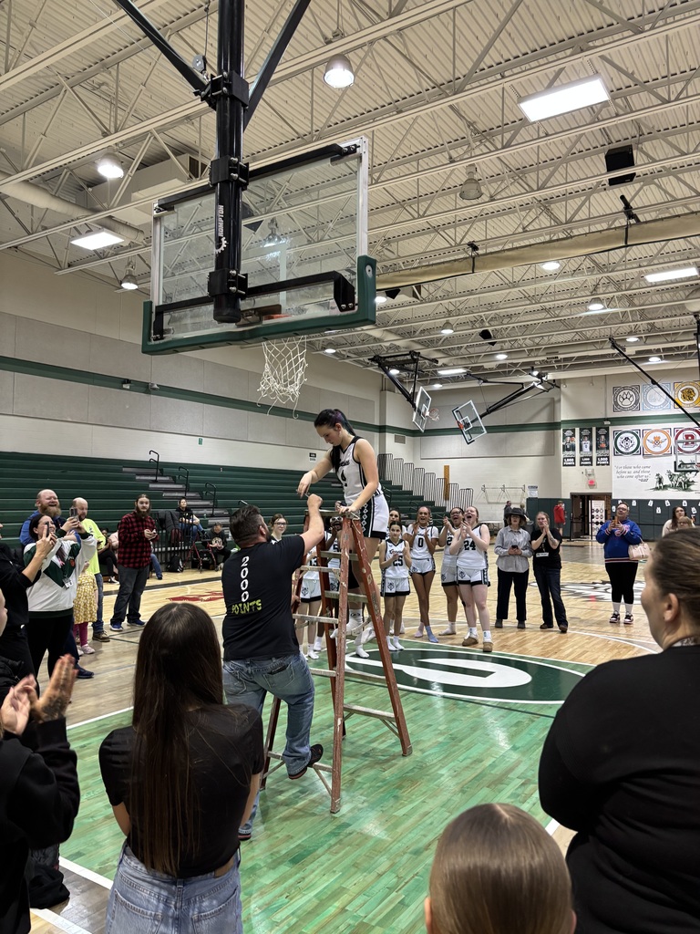Kiera Little cutting the net