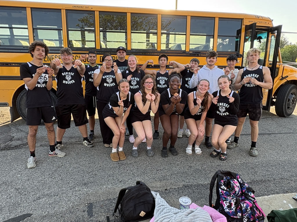 Track team after regionals posing with medals earned.