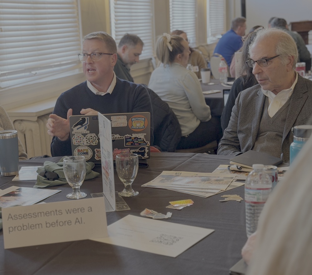 Expert panel member Patrick Whipple (Left) from Genesee Valley BOCES and convening speaker Roger Rosen (Right) from the Allison-Rosen Foundation discuss one of the Rochester Provocations with educators. 