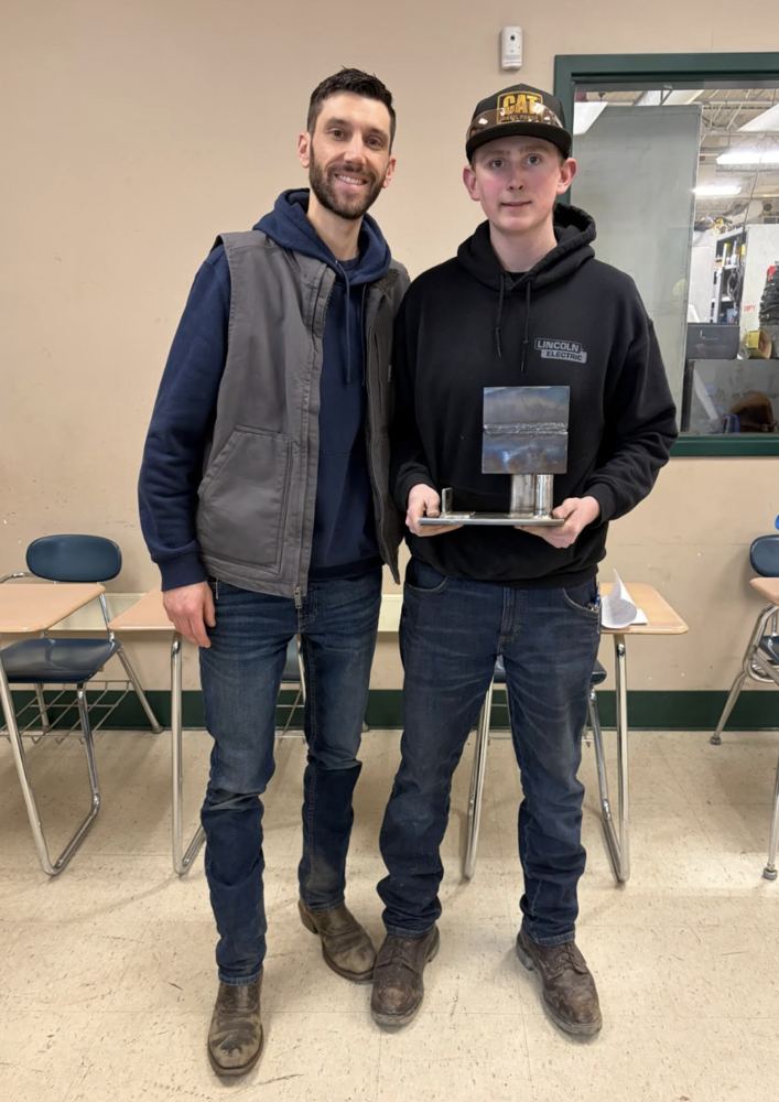 Welding Student and Teacher