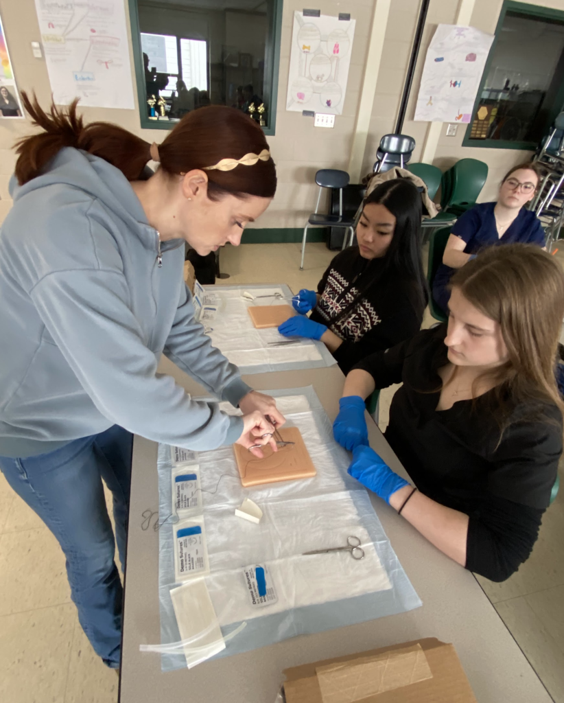 Students practicing effective suturing techniques