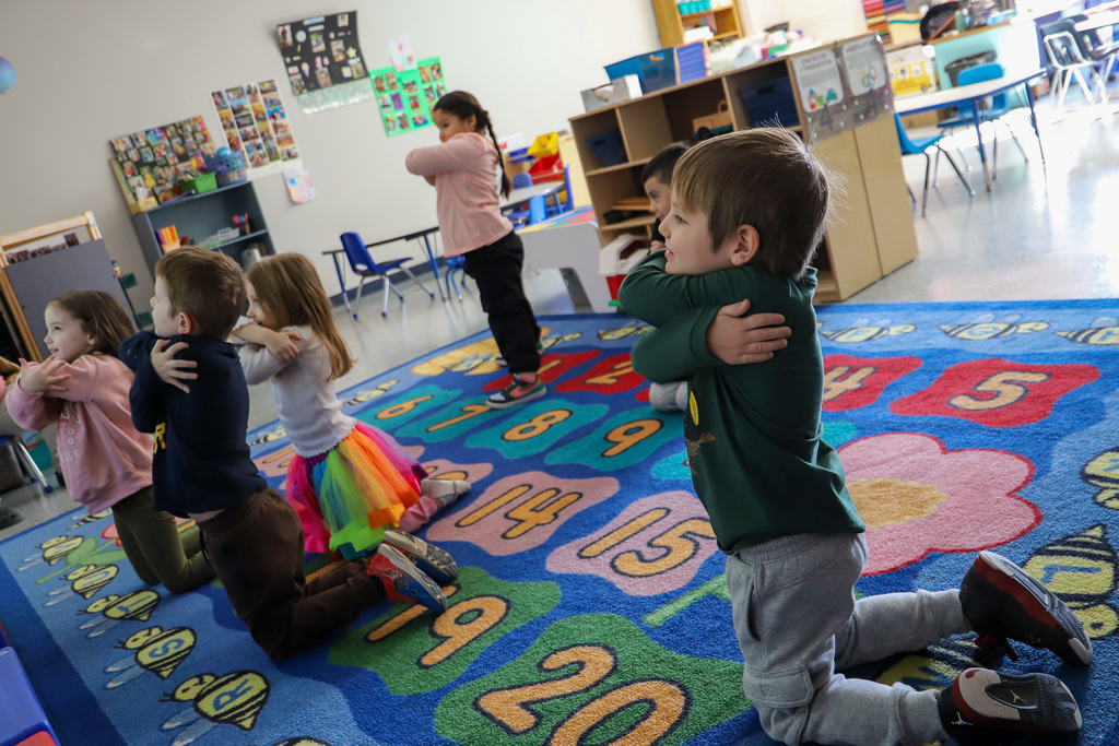 students doing yoga