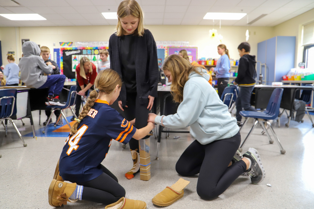 image of students building prosthetic leg