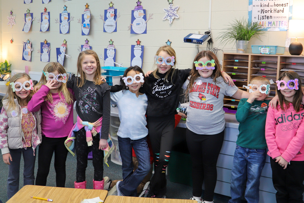 students wearing 100 day glasses