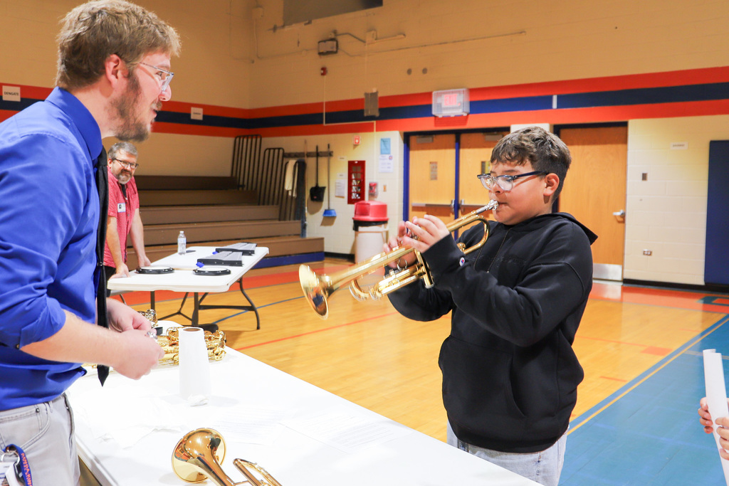 student playing trumpet