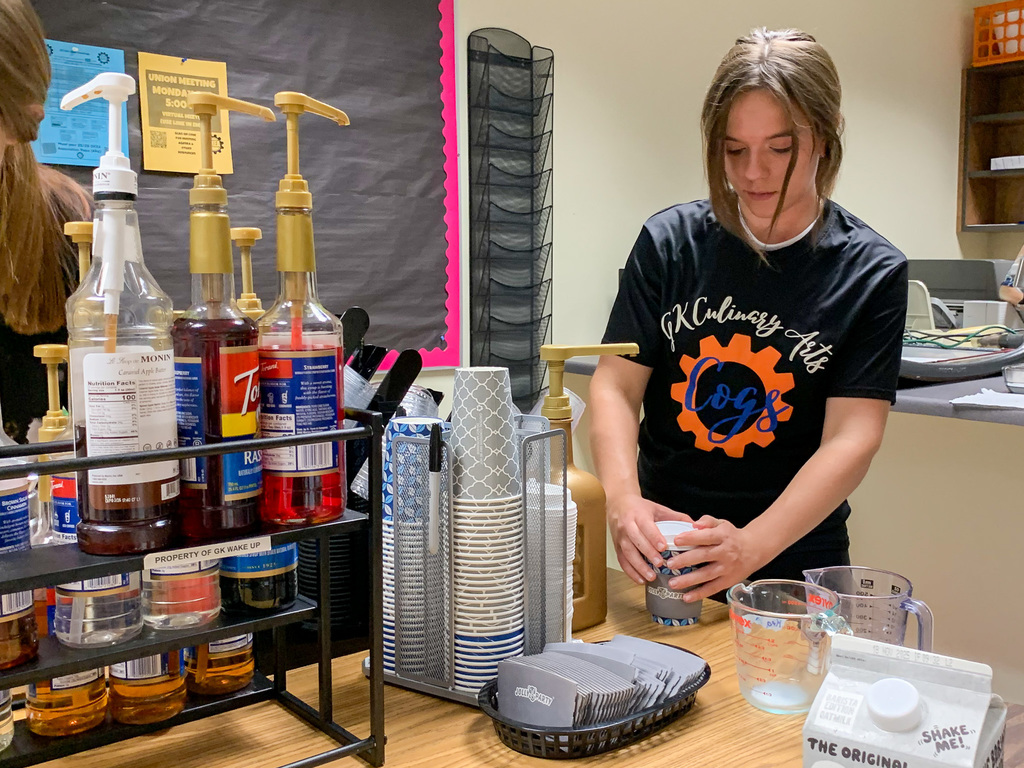 students making coffee