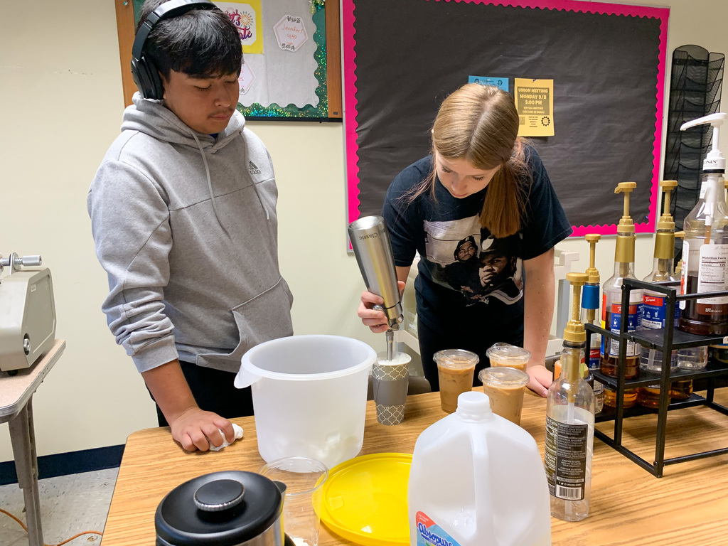 students making coffee