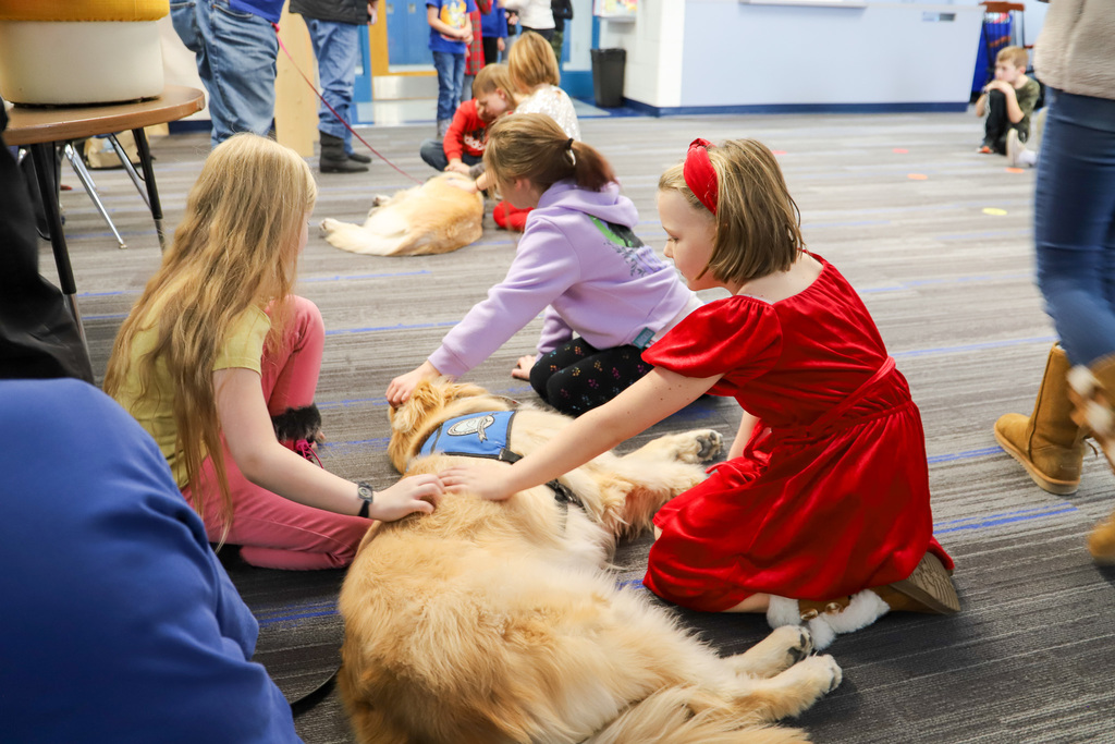 Therapy dog and students