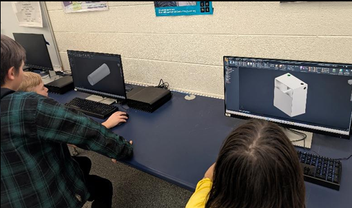 image of students looking at computers