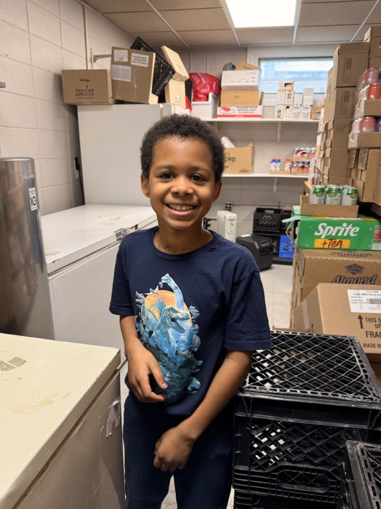 student at food pantry