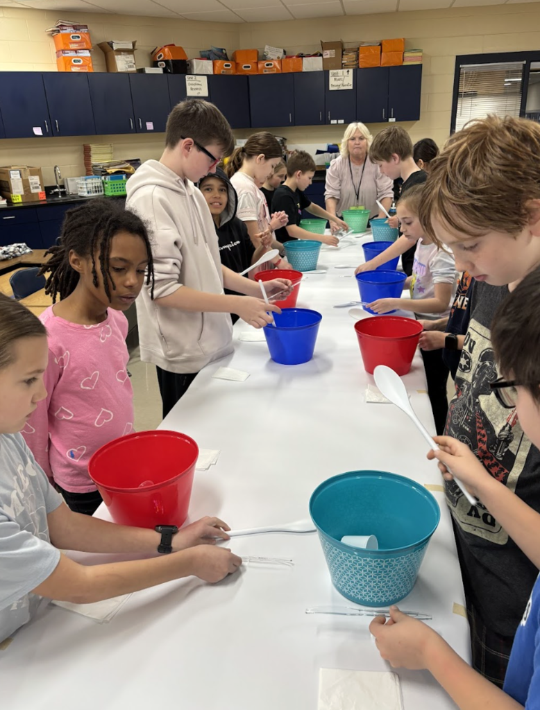 Students mixing ingredients
