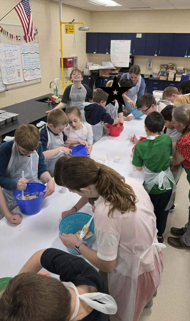 Students mixing batches of dough