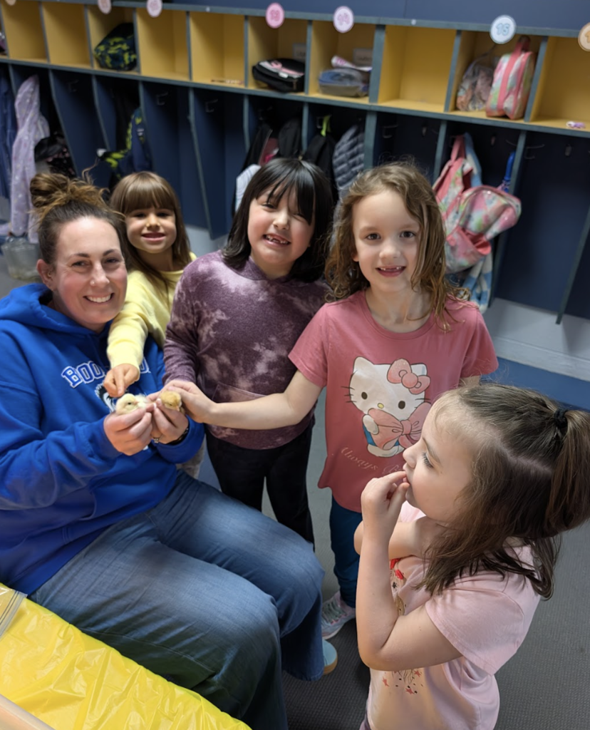 Mrs. Cassaday with students and chick