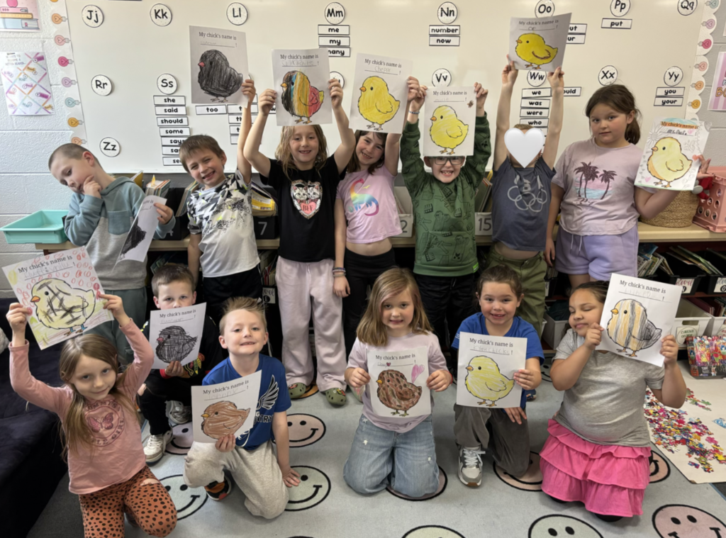 Students with their chick paperwork from their lesson