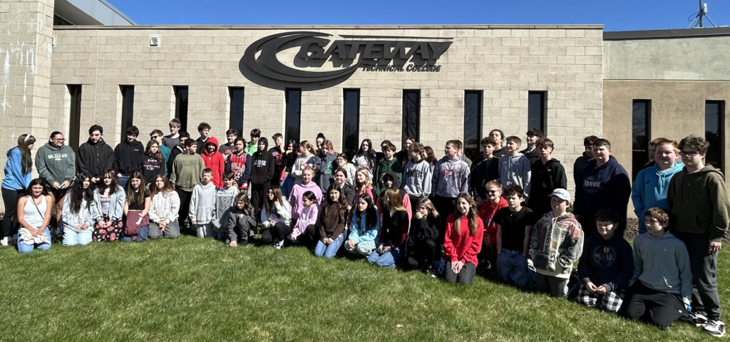 7th and 8th graders in front of Gateway's buildling