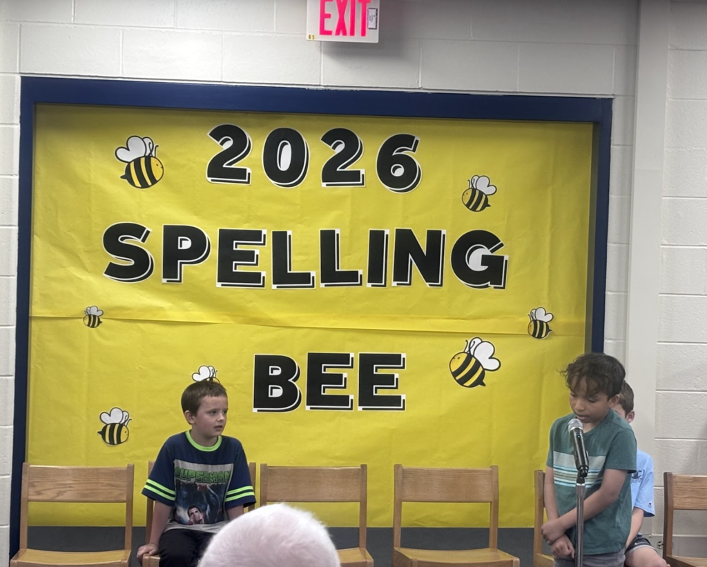 Student partaking in the BES all school spelling bee