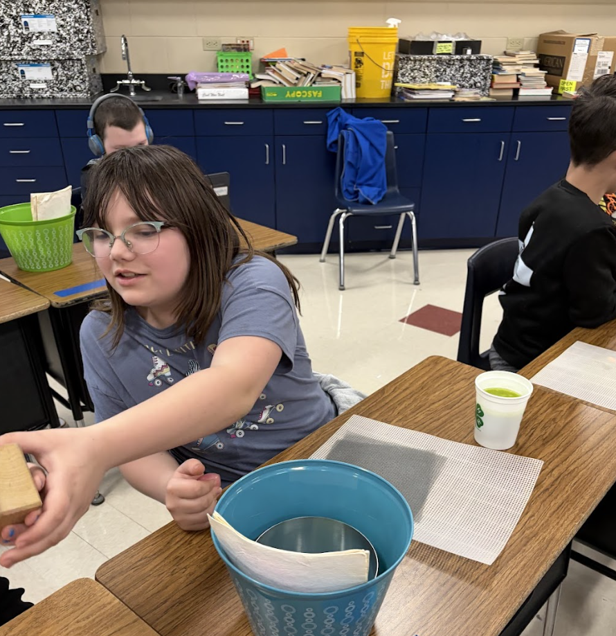 Students working on a project for Arbor Day